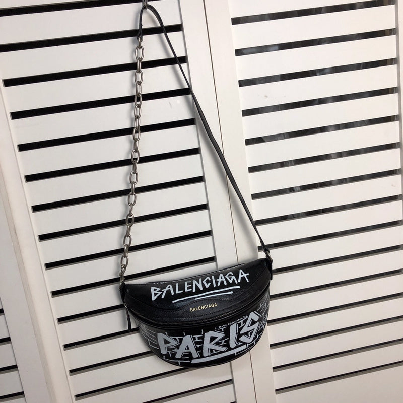 Handle and strap detail of structured everyday-luxe women's handbag – women's designer-style accessory