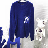 Close-up detail shot of Louis Vuitton luxury clothing with contemporary cut