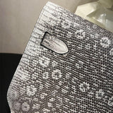  smart crossbody bag detail view showing craftsmanship