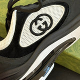 Side profile of Gucci soft grey sneakers premium leather build