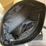 Close-up detail of polished chic women's handbag – women's luxury accessory