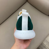 Hermès Camel Slip-On Sneakers - Angled View