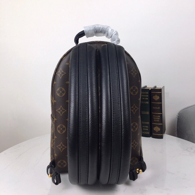 Styled lifestyle shot of classic modern women's handbag – women's luxury accessory