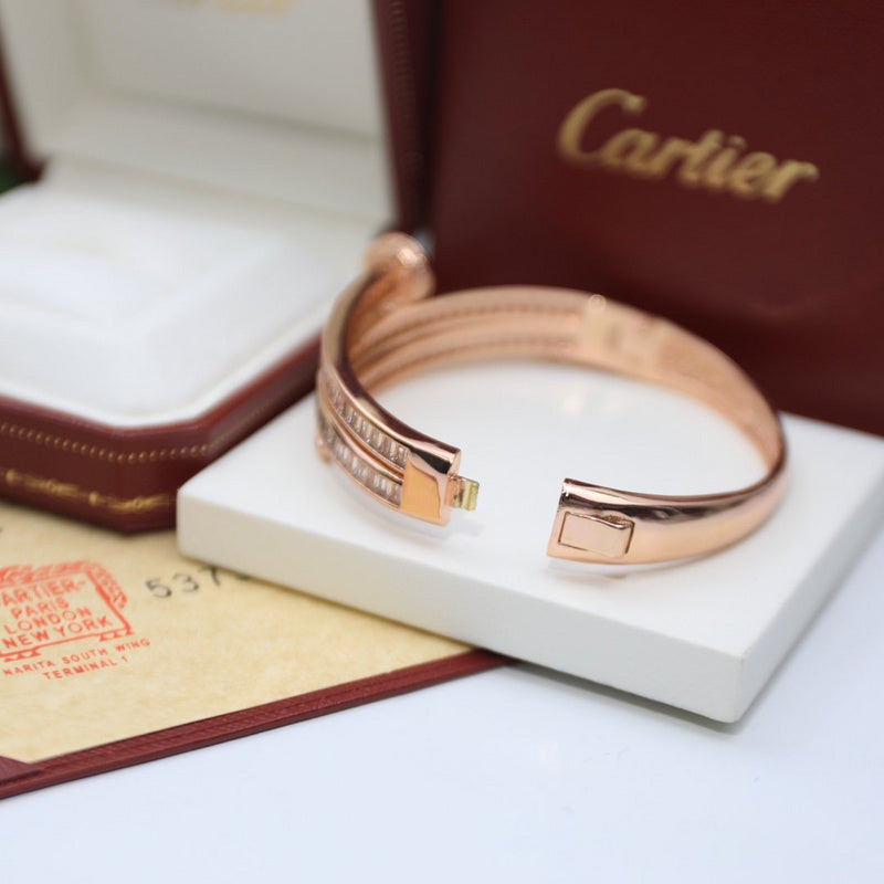 Angled view of Cartier unisex jewelry piece