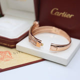 Angled view of Cartier unisex jewelry piece