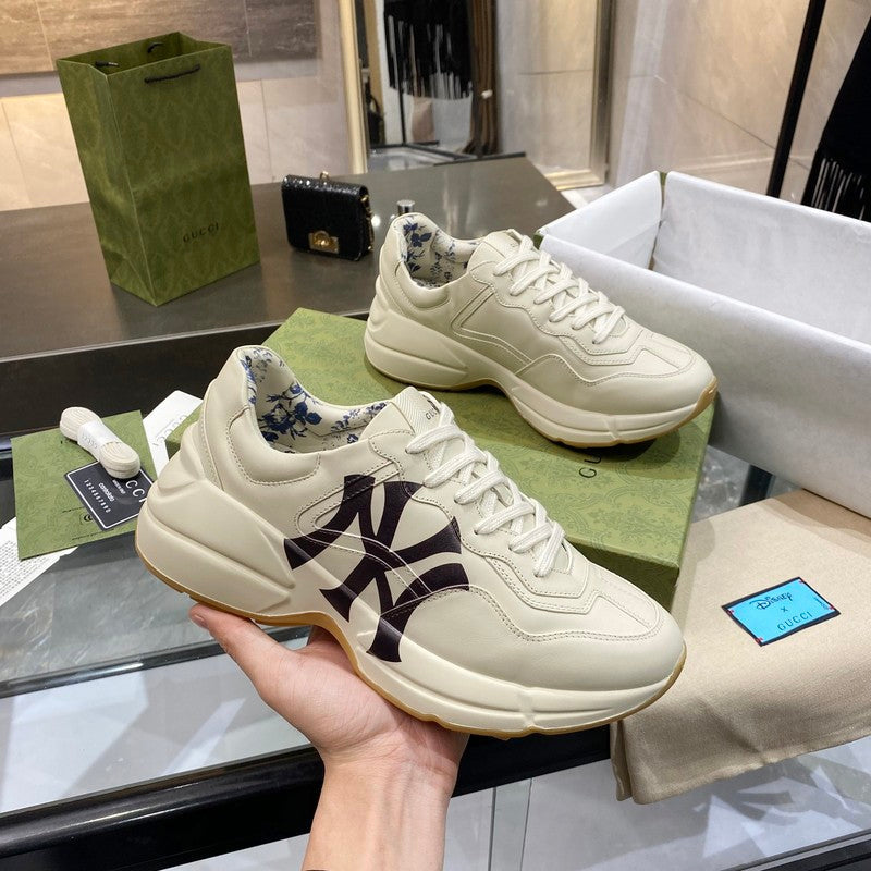 Gucci Luxury sneakers in tonal black bold athletic profile front view