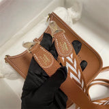  Clean-Lined tote bag carried on shoulder 16
