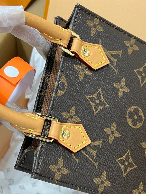  Signature satchel carried on shoulder