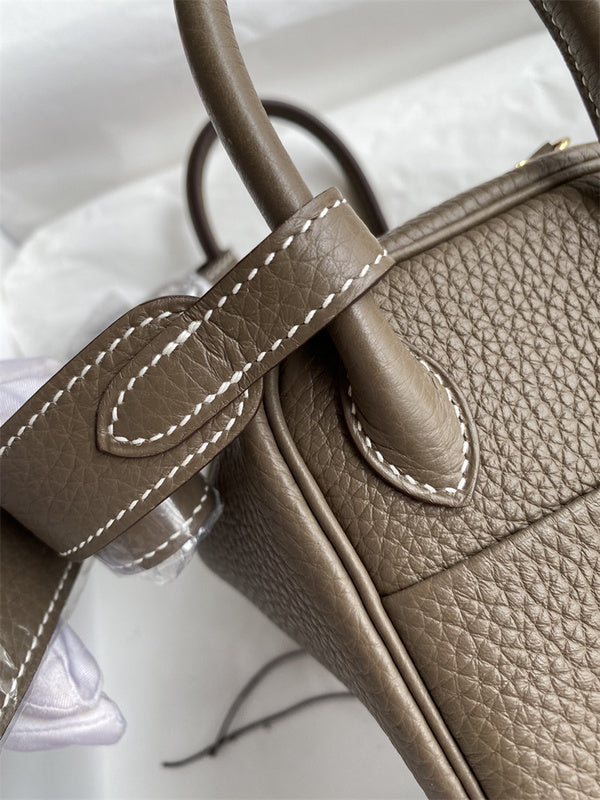 Side view of polished structured handbag