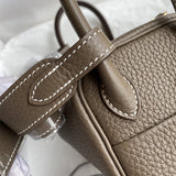 Side view of polished structured handbag