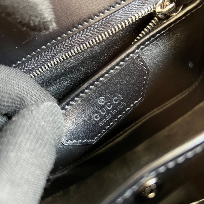 Side view of effortless structured handbag