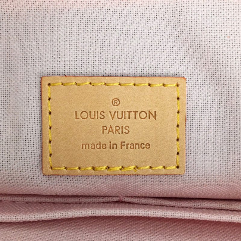 Handle and strap detail of signature polished women's handbag – women's everyday handbag