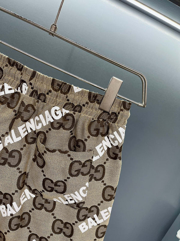 Close-up detail shot of Gucci luxury clothing with monogram-inspired silhouette