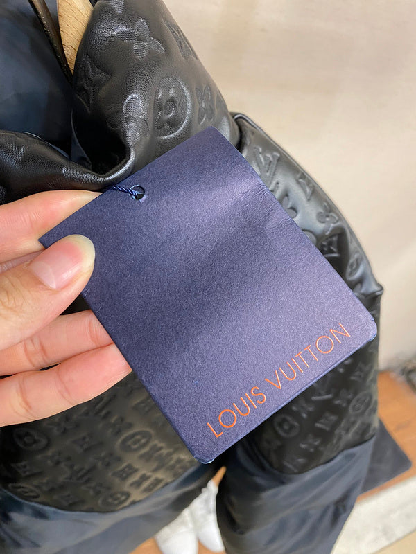 Side profile of Louis Vuitton luxury clothing with label-forward styling