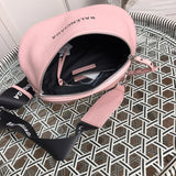 Close-up detail of structured signature women's handbag – women's luxury handbag