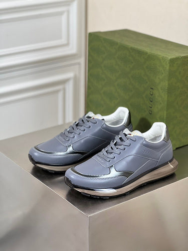 Gucci Designer sneakers in bold contrast breathable knit upper front view