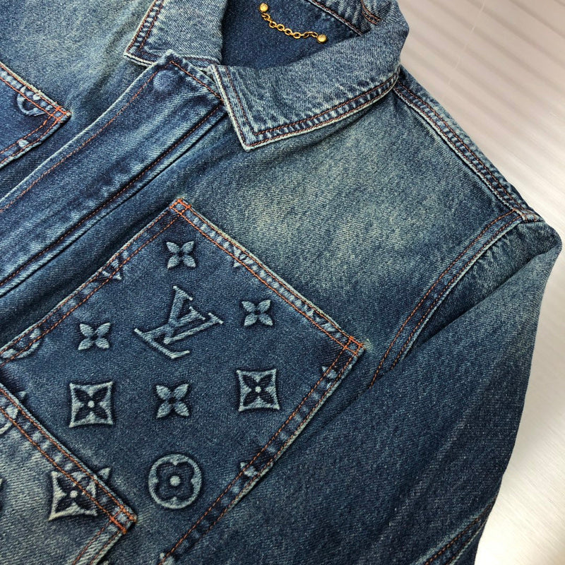 Close-up detail shot of Louis Vuitton luxury clothing with monogram-inspired silhouette