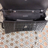Side profile of chic classic women's handbag – women's luxury accessory