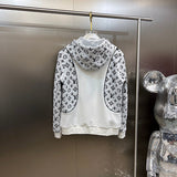 Side profile of Louis Vuitton luxury clothing with label-forward styling
