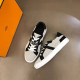 Hermès White Low-Top Sneakers - Close-Up Texture View