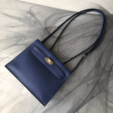Side view of sleek structured handbag