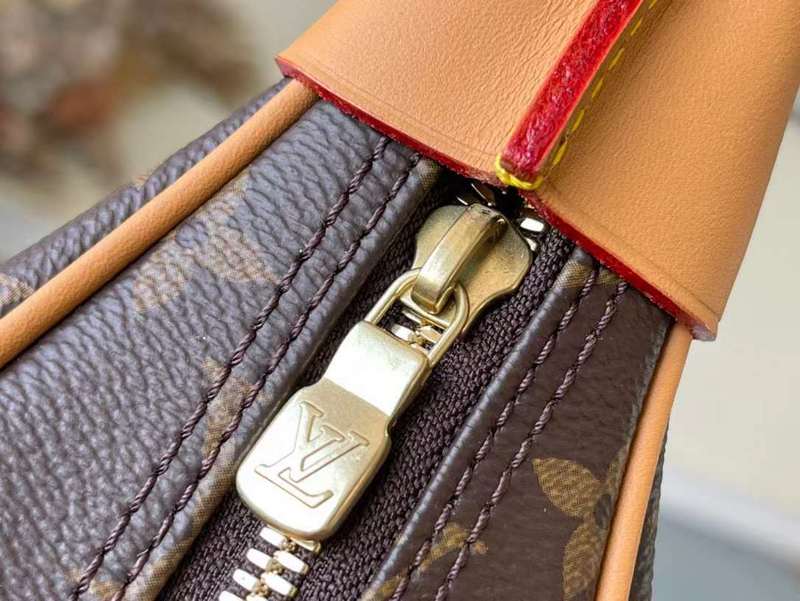 Handle and strap detail of refined statement women's handbag – women's luxury accessory