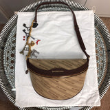 Front view of sleek refined women's handbag – women's luxury handbag