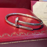 Front view of Cartier unisex jewelry piece
