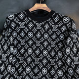 Full styled look of Louis Vuitton luxury clothing with monogram-inspired silhouette