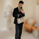  streamlined structured bag styled with outfit 36