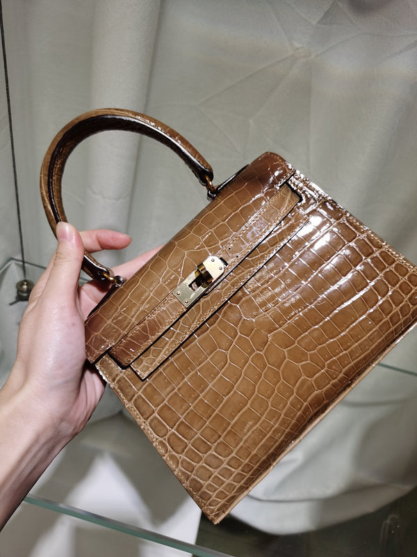 Side view of graceful structured handbag