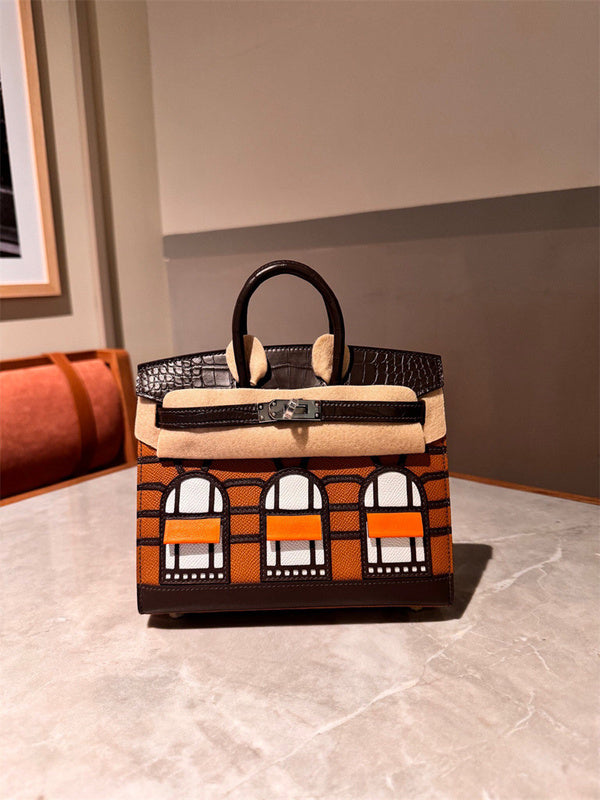 Side view of polished structured handbag