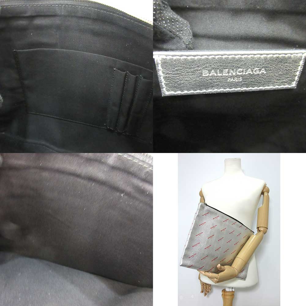 Side view of Balenciaga clutch Silver premium designer bag