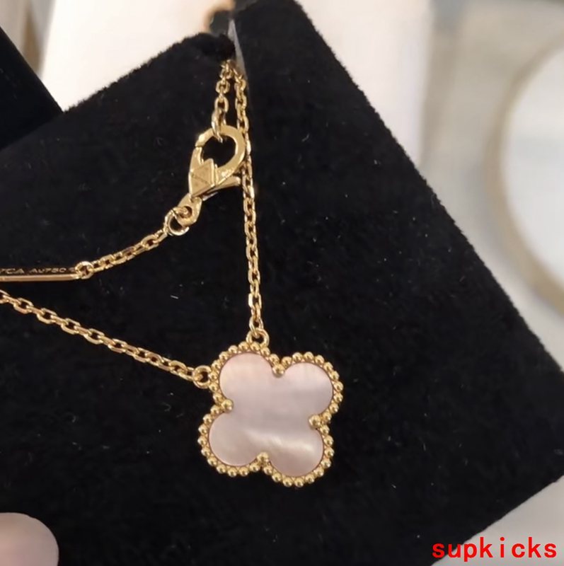 Lifestyle view of Van Cleef & Arpels unisex jewelry piece