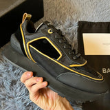 Gucci Casual sneakers in classic monochrome retro runner design front view