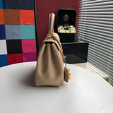 Styled lifestyle shot of signature classic women's handbag – women's designer-style accessory