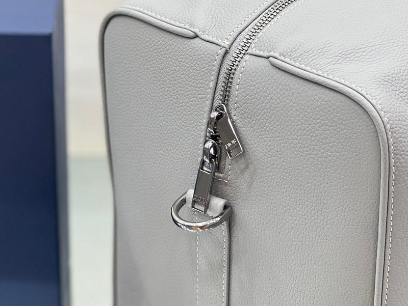 Handle and strap detail of everyday-luxe signature women's handbag – women's designer-style accessory