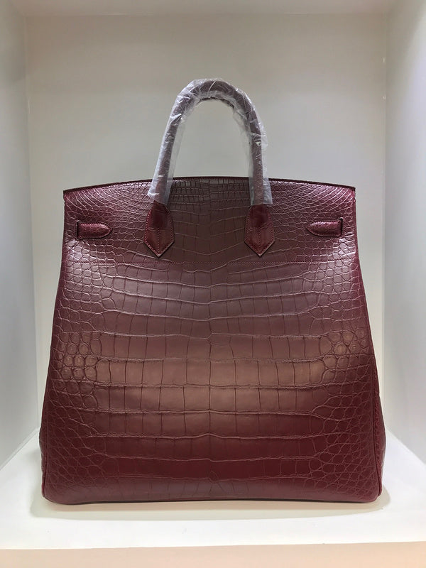 Side view of sophisticated structured handbag