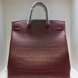 Side view of sophisticated structured handbag