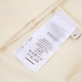 Close-up detail shot of Gucci luxury clothing with contemporary cut