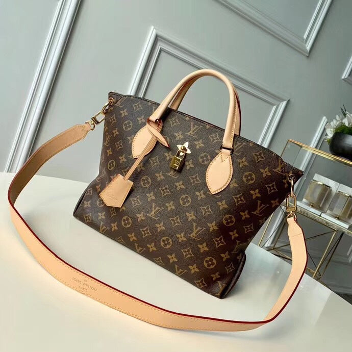 Front view of refined signature women's handbag – women's luxury handbag