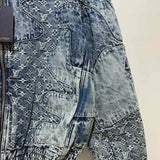 Front view of Louis Vuitton luxury clothing with signature branding