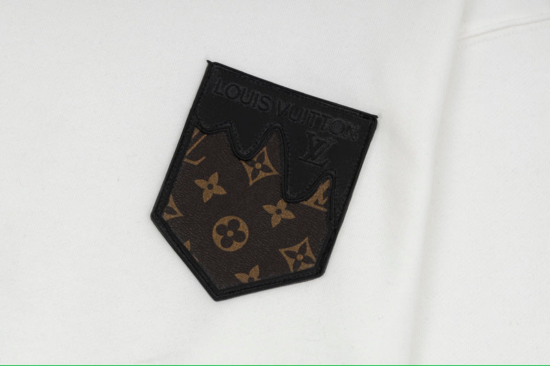 Back view of Louis Vuitton luxury clothing with signature branding