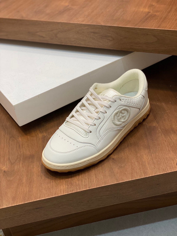Side profile of Gucci bold contrast sneakers streetwear statement look