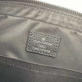 Side profile of elevated statement women's handbag – women's statement bag