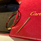 Close-up detail view of Cartier unisex jewelry piece