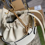 Styled lifestyle shot of everyday-luxe classic women's handbag – women's luxury accessory