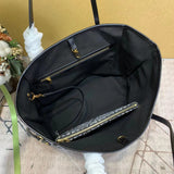 Side profile of polished statement women's handbag – women's luxury handbag