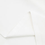 Flat lay presentation of Polo cotton polo shirt with monogram-inspired silhouette