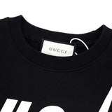 Close-up detail shot of Gucci luxury clothing with tailored silhouette